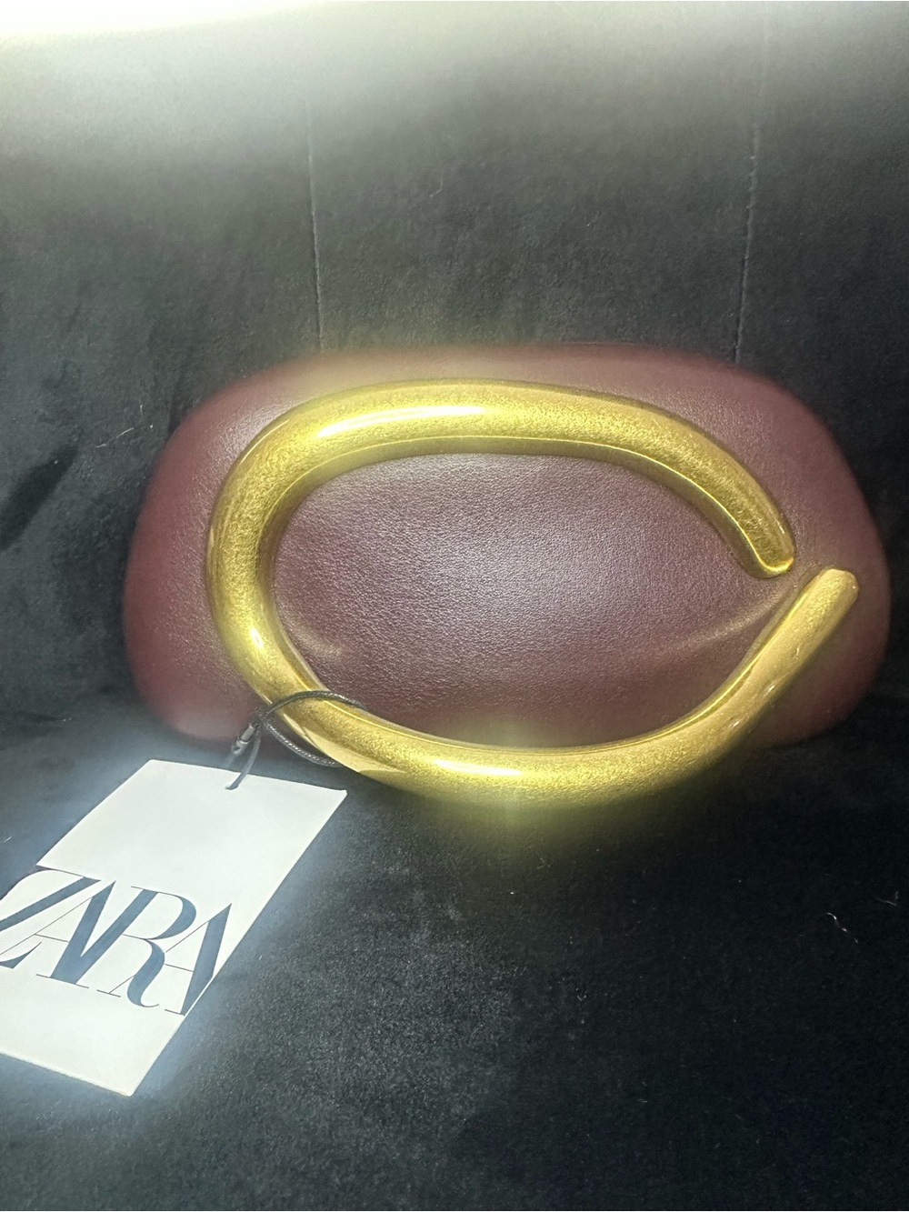 Zara Bordeaux clutch with brushed gold hardware